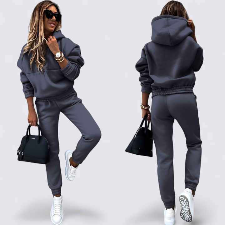 Charcoal grey hooded sweatshirt and jogger set shown from the front and the back on a model