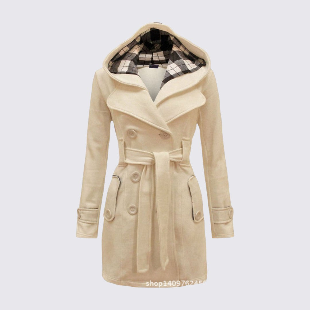 Cream hooded trench coat with tie belt, double button front and plaid lined hood