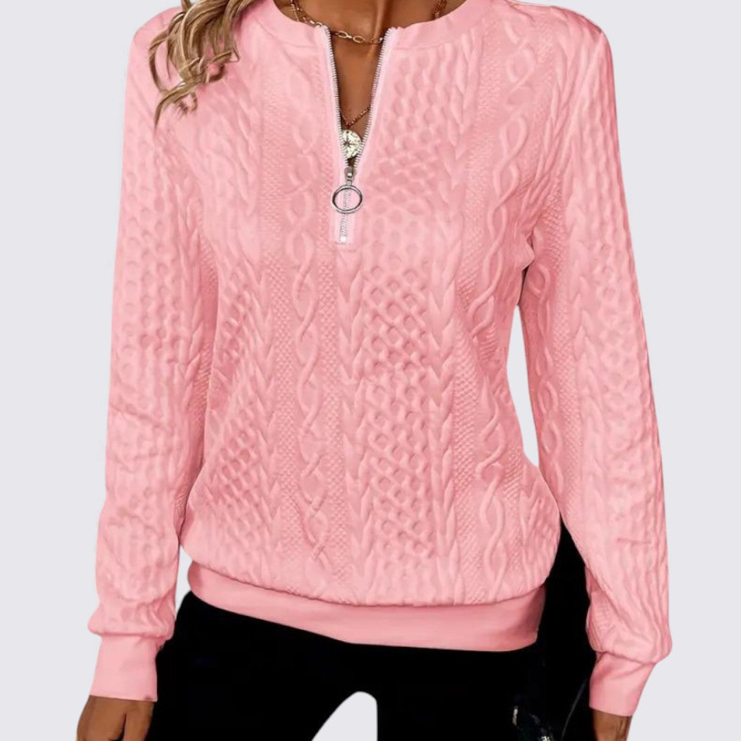 Pink quarter zip cable knit sweater with ribbed cuffs and hem, front view