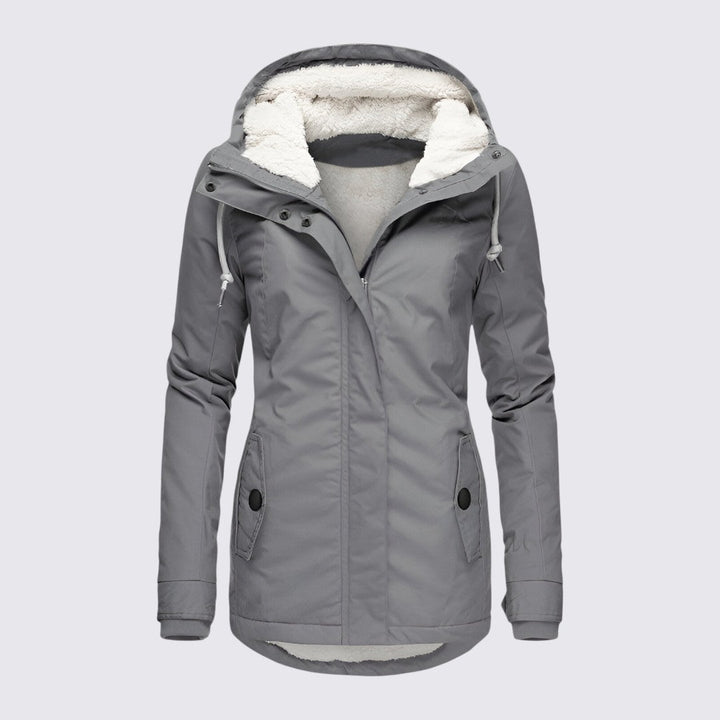Grey hooded parka with a cream sherpa lining, snap flap pockets and drawstring hood, front view