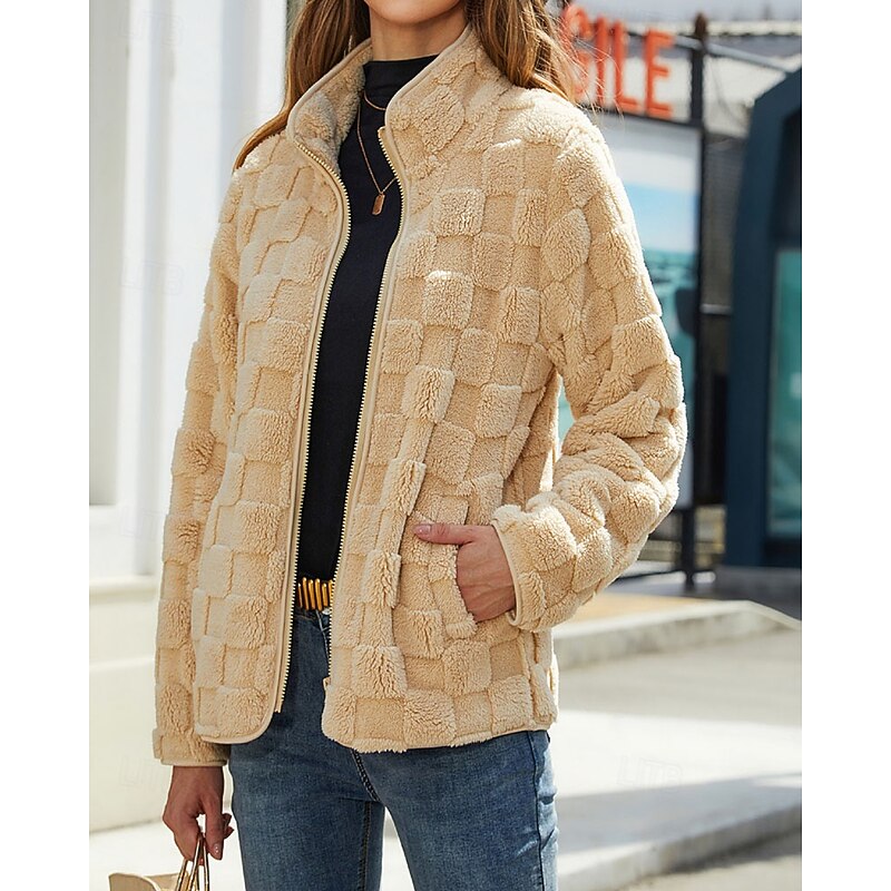 Apricot checkerboard texture zip jacket worn open, front view