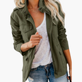 Army green zip front tailored jacket worn open over a white tee