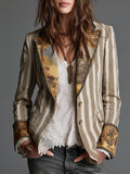 Khaki striped blazer with printed lapels and cuffs over a lace top and jeans