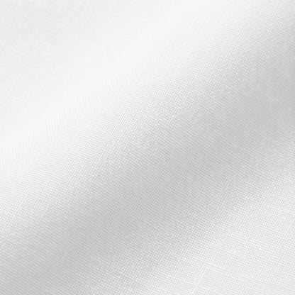 Close-up of the fine linen-look weave of the white blouse
