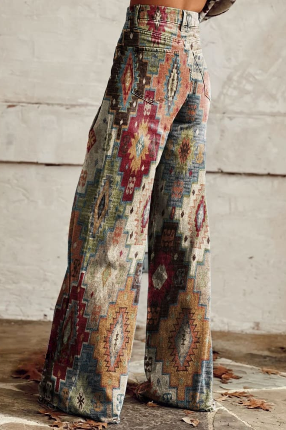 Wide leg Aztec print pants showing the high waist, back view
