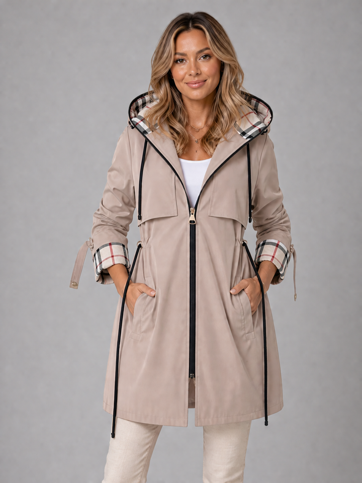 Beige hooded parka with a check lined hood, worn open