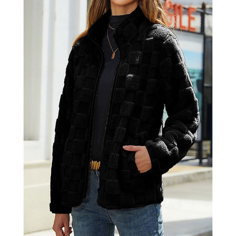 Black checkerboard texture zip jacket worn open, front view