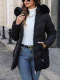Black quilted coat with a black faux fur hood, worn open