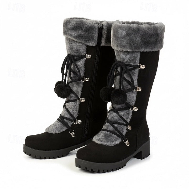 Single black fur cuff lace boot seen from the outer side