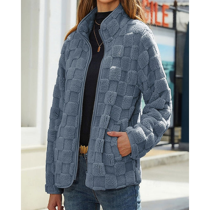 Blue checkerboard texture zip jacket worn open, front view