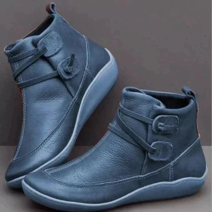 Blue side lace ankle boots seen from the outer side