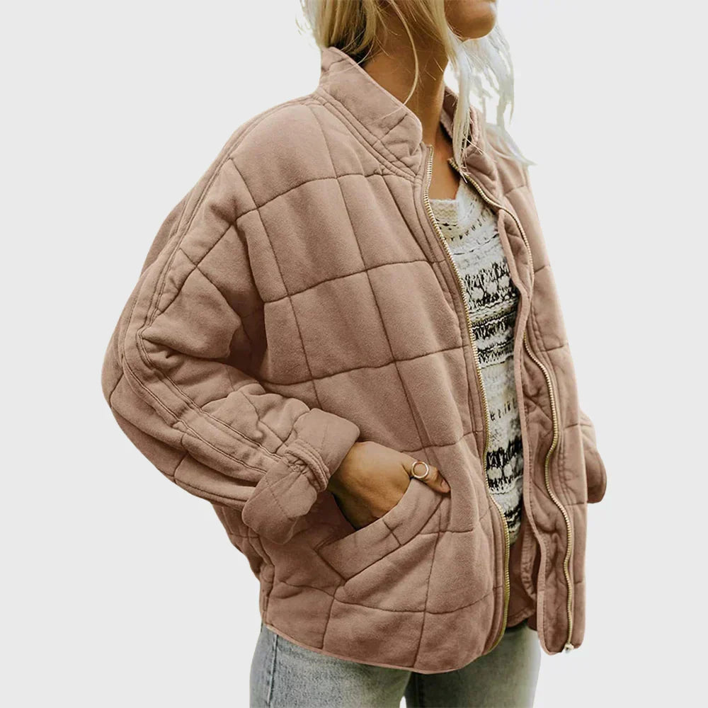 Blush box quilted bomber jacket with square quilting, front view