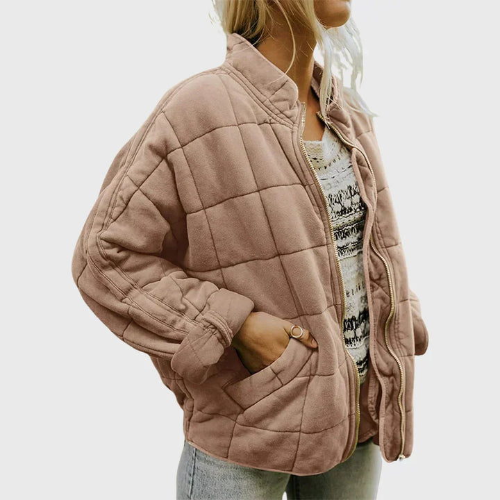 Blush box quilted bomber jacket with square quilting, front view