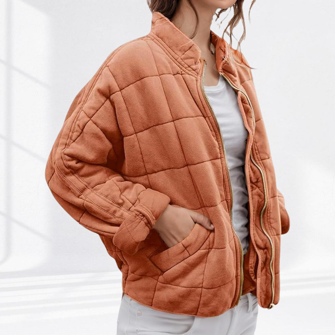 Rust box quilted bomber jacket with square quilting, front view