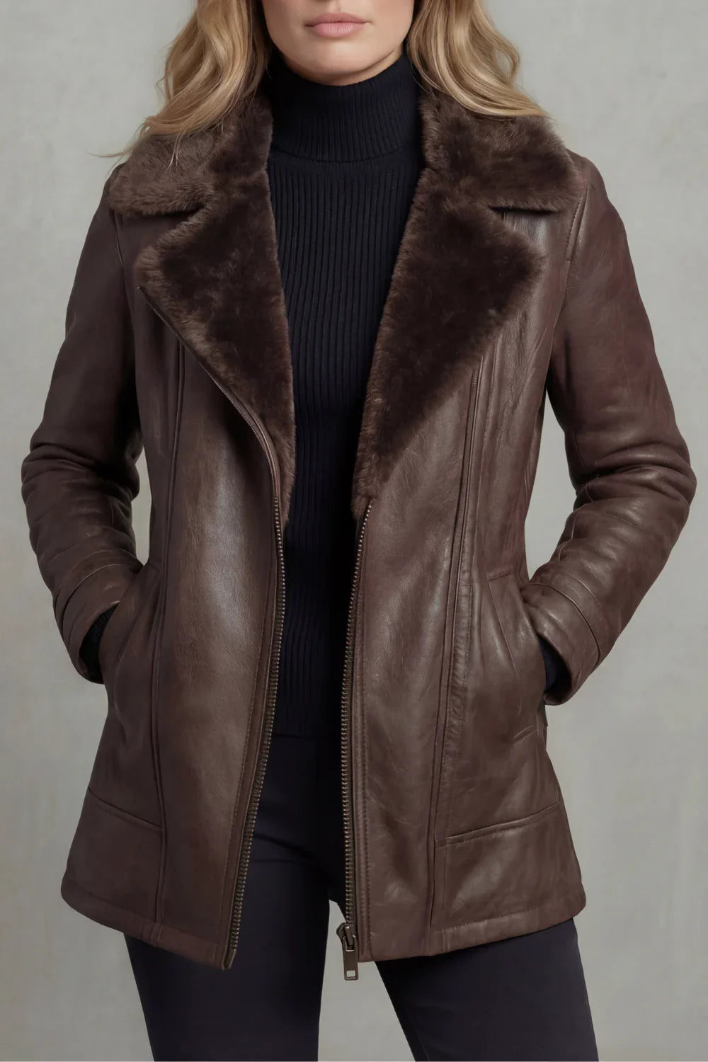 Brown leather jacket with a shearling lined collar, front view