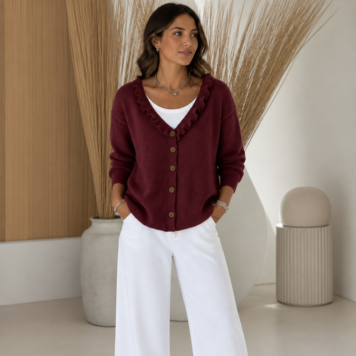 Burgundy knit cardigan with ruffle trimmed V neck and button front, front view