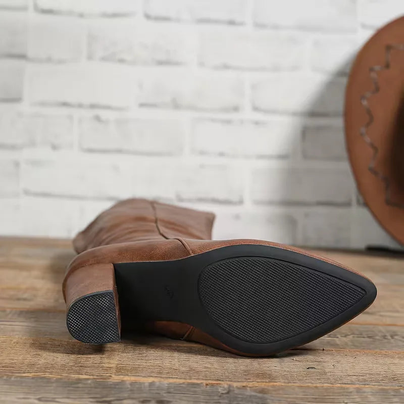 Outsole of the brown chunky heel knee boot