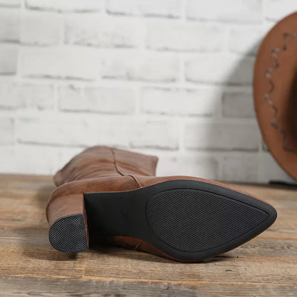 Outsole of the brown chunky heel knee boot