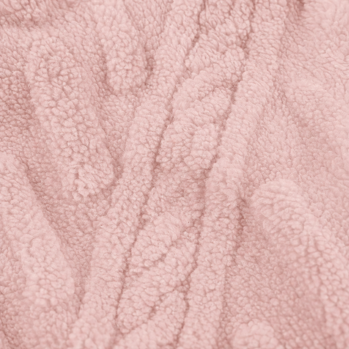 Close up of the cable textured pink sherpa fleece