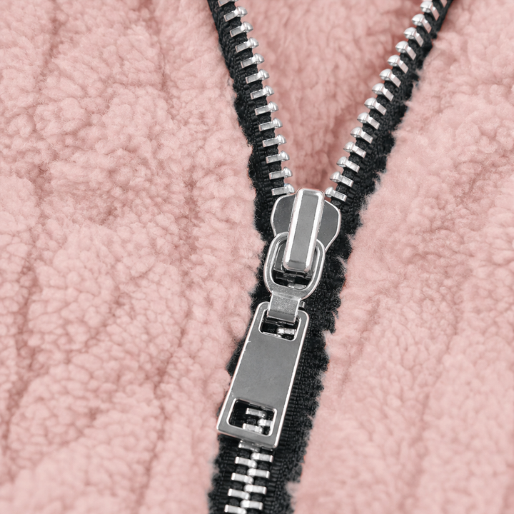 Silver half zip pull on a pink plush fleece pullover
