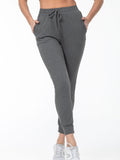 Cuffed Drawstring Joggers in Black | Valenira