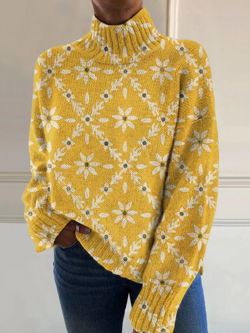 Yellow turtleneck sweater with a daisy and vine lattice pattern
