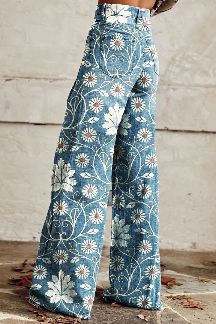 Blue daisy vine print wide leg pants showing the back pockets, back view