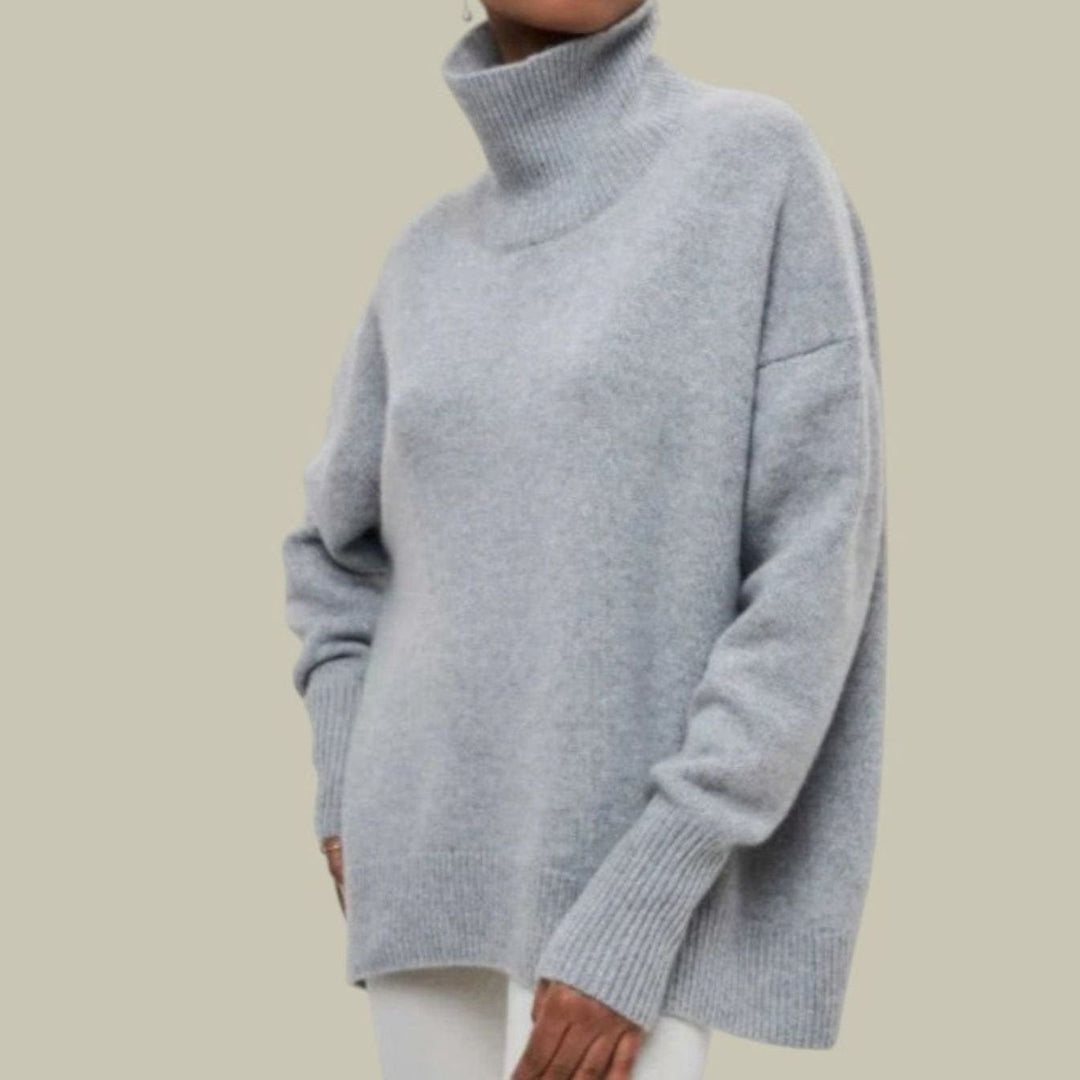 Light gray oversized turtleneck sweater with ribbed cuffs