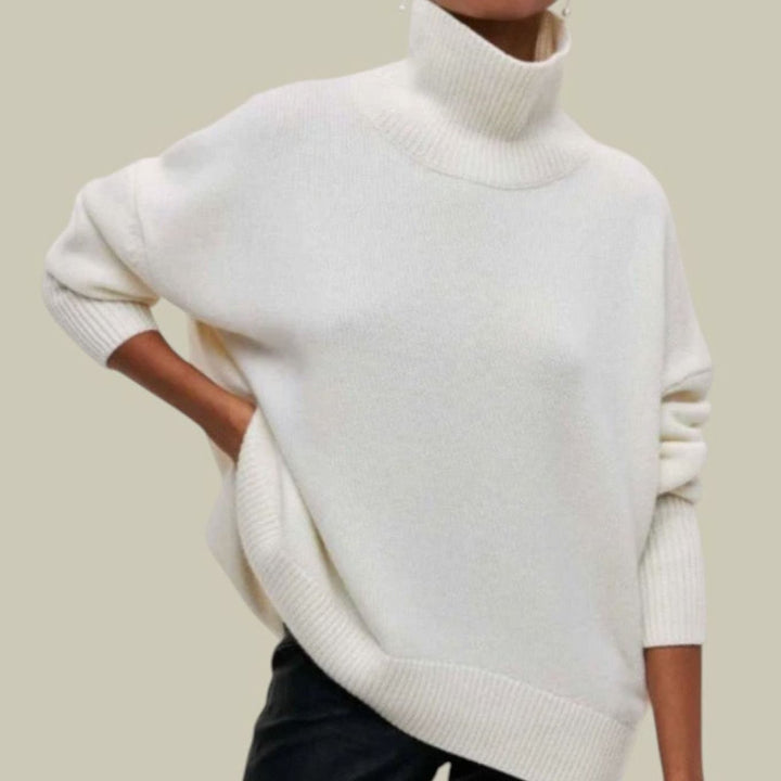 Ivory oversized turtleneck sweater with ribbed hem, front view