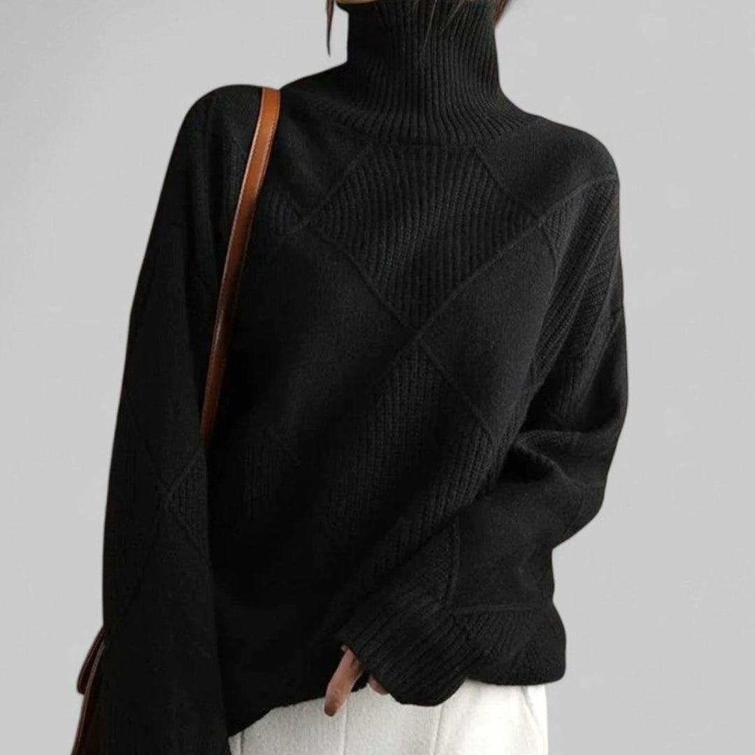 Black oversized turtleneck sweater with diamond knit texture
