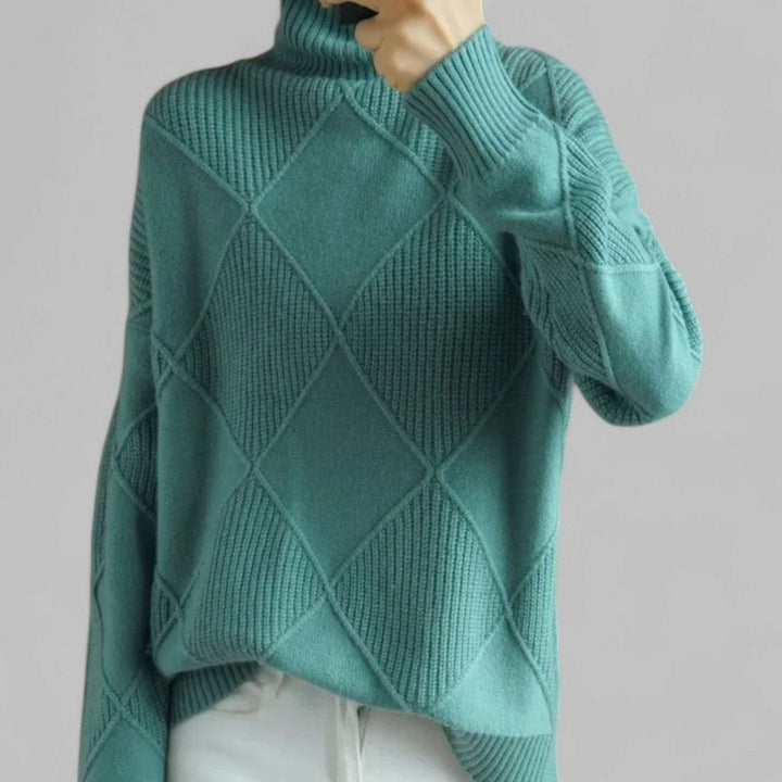 Teal green oversized turtleneck sweater with diamond knit pattern