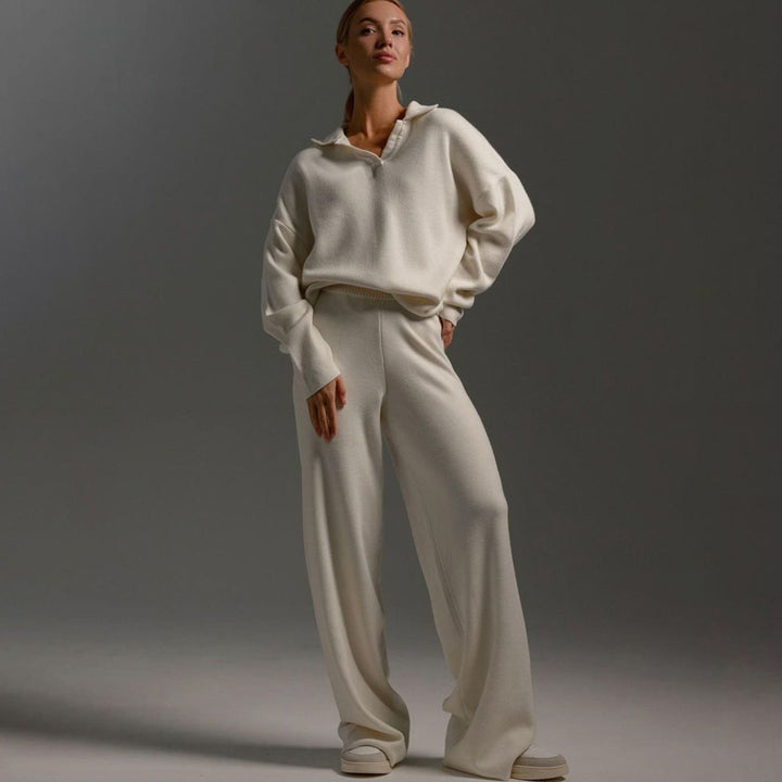 Cream knit lounge set with a collared sweater and wide leg trousers, full length view
