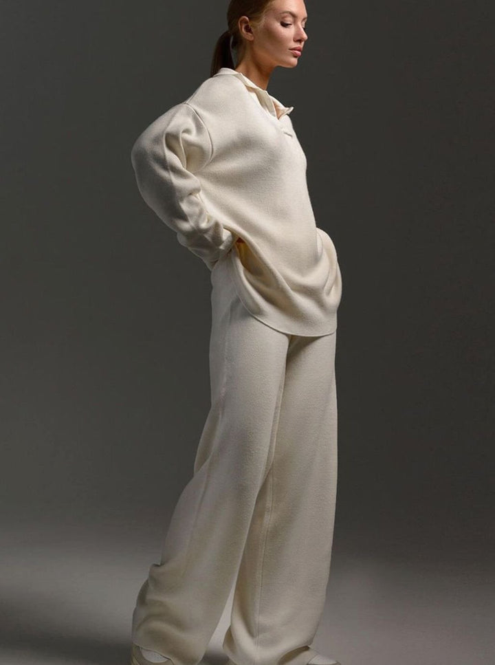 Cream two piece lounge set with collared top and wide leg pants, side view