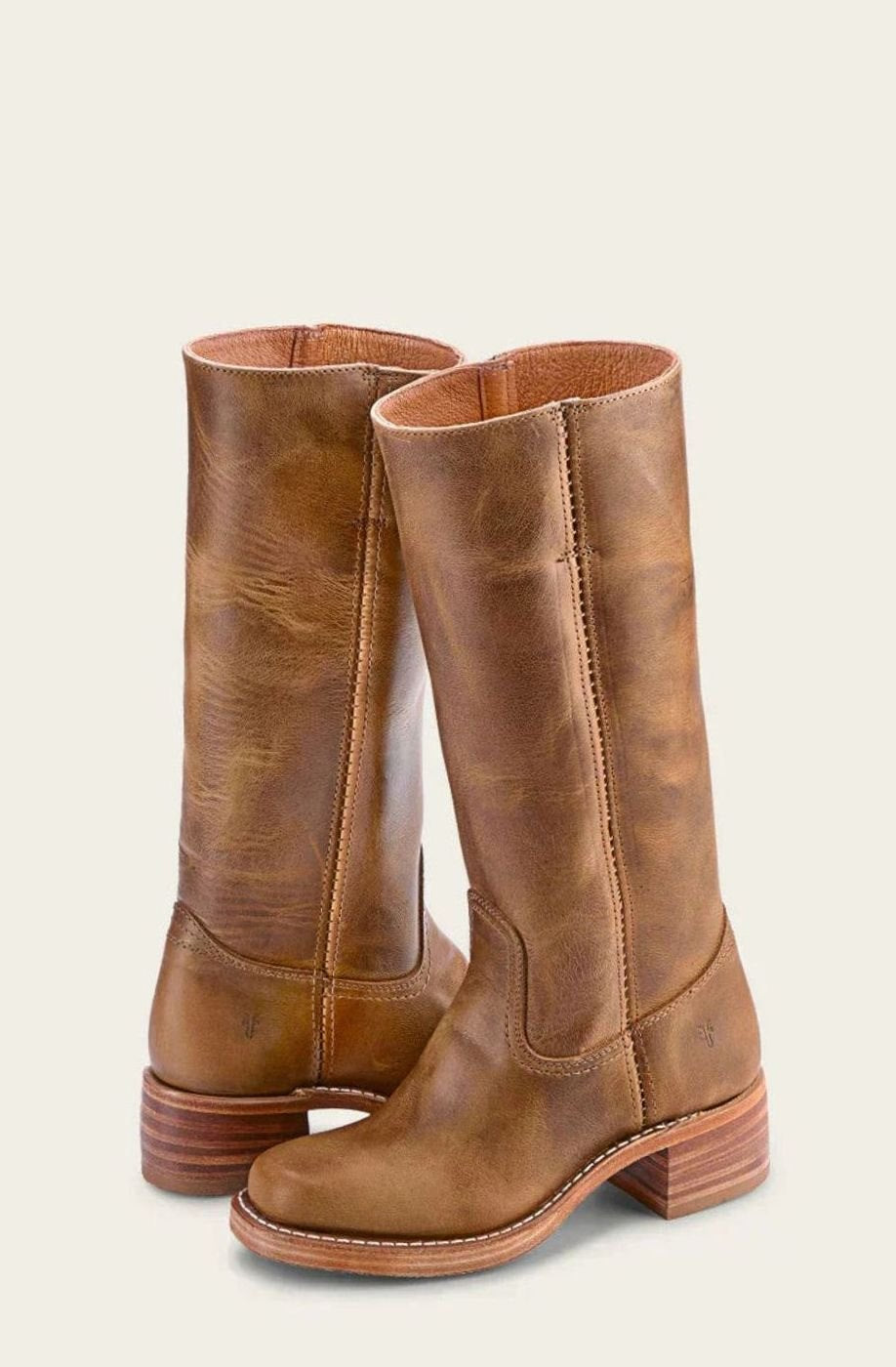 Pair of tan leather mid calf pull on western boots with stacked heel