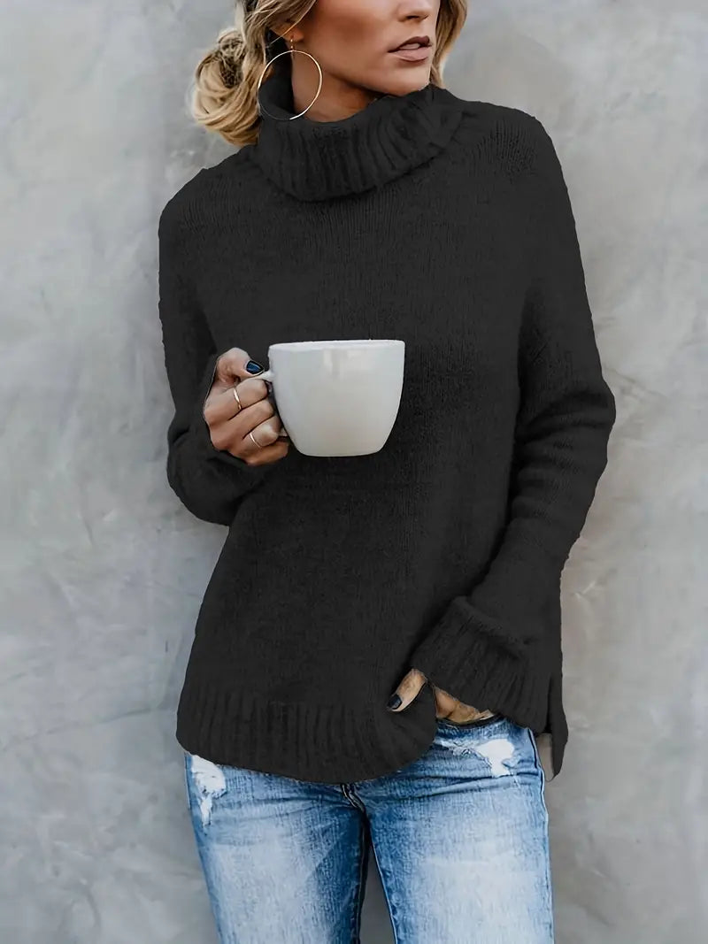 Black turtleneck sweater with a rolled collar and ribbed hem, front view