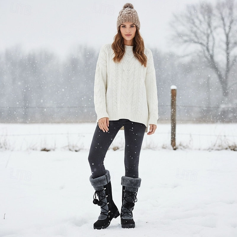 Fur cuff lace boots worn with leggings and a knit sweater outdoors