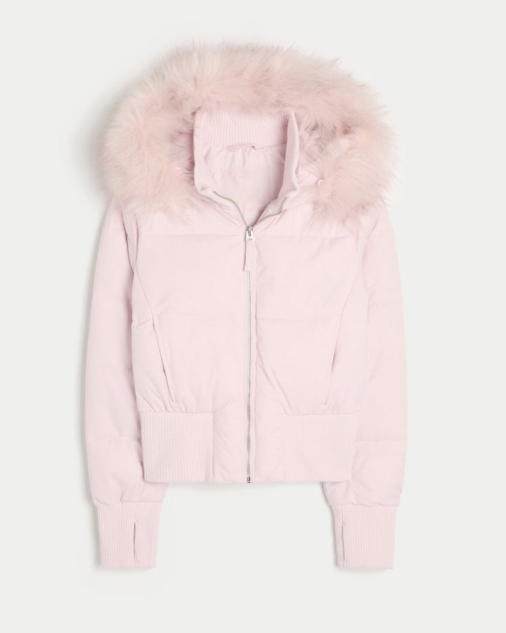 Pink cropped puffer jacket laid flat with a faux fur hood trim