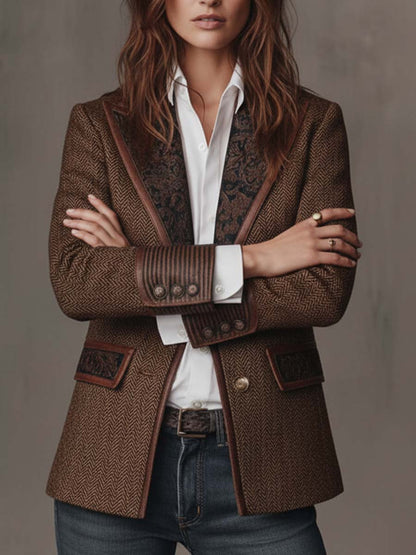 Brown herringbone blazer, front view with arms crossed showing ribbed cuffs