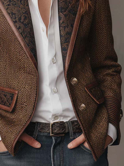 Close-up of the two-button front of the herringbone blazer