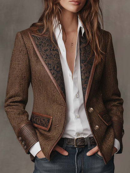 Brown herringbone blazer with paisley lapels over a white shirt and jeans