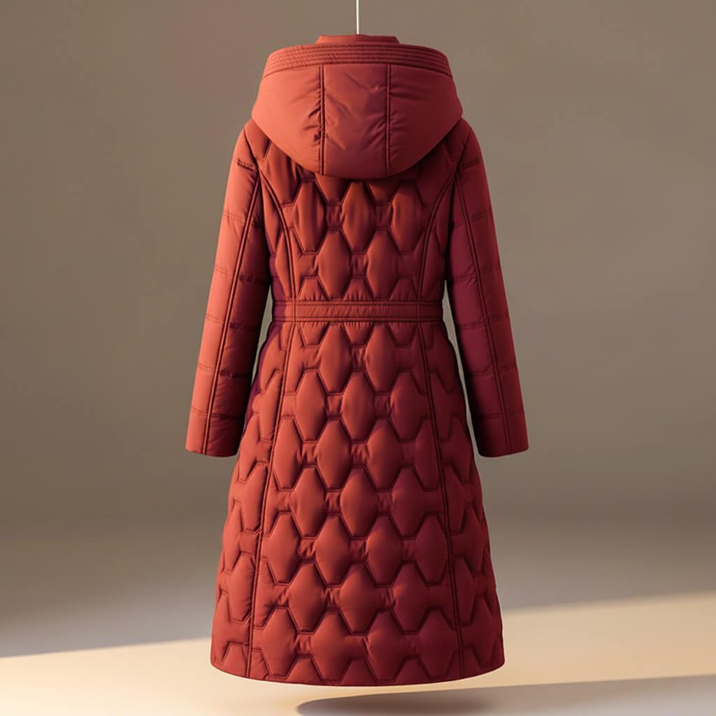 Back view of the rust red honeycomb quilted hooded coat on a hanger