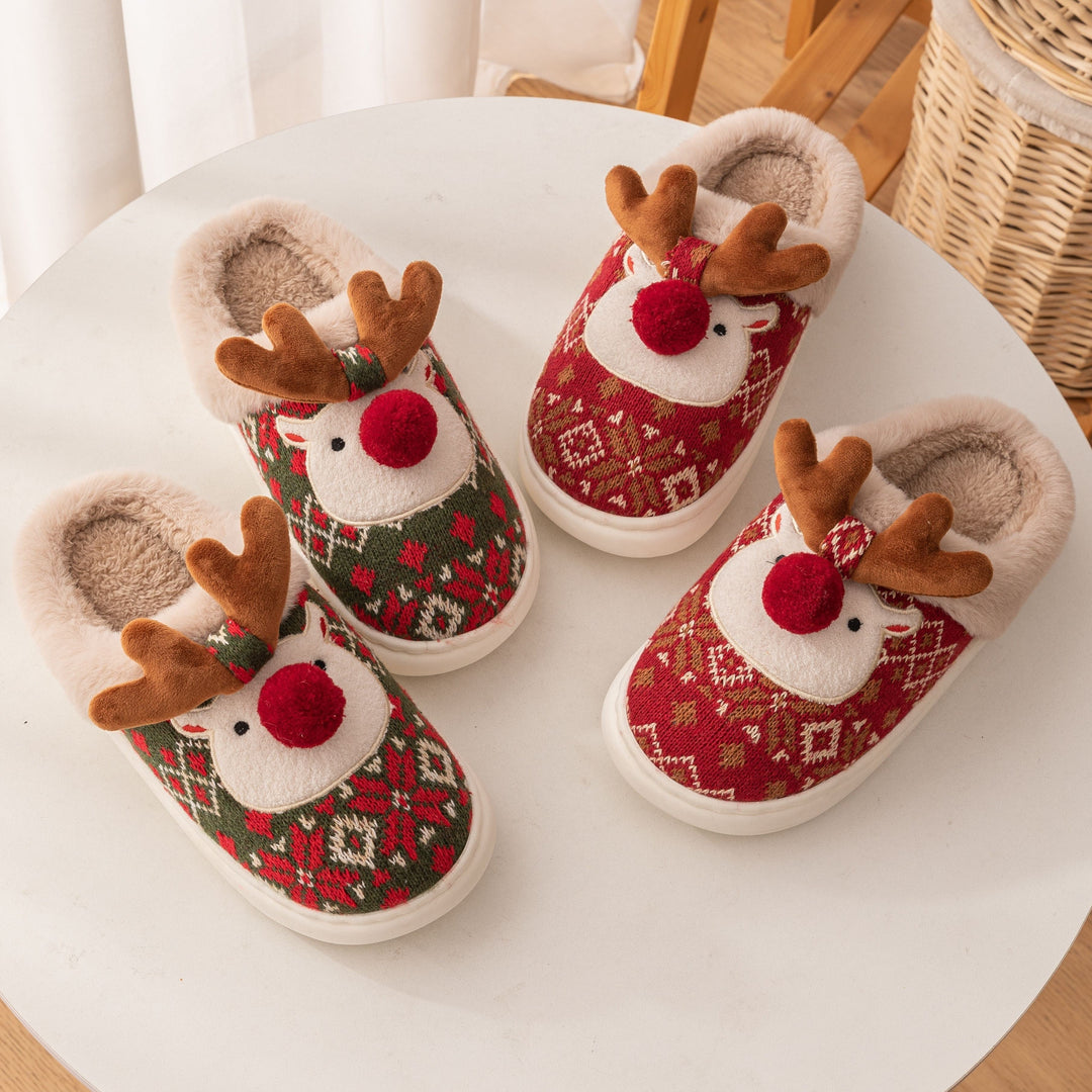 Three pairs of plush reindeer slippers in red and green knit with antlers and pom pom noses