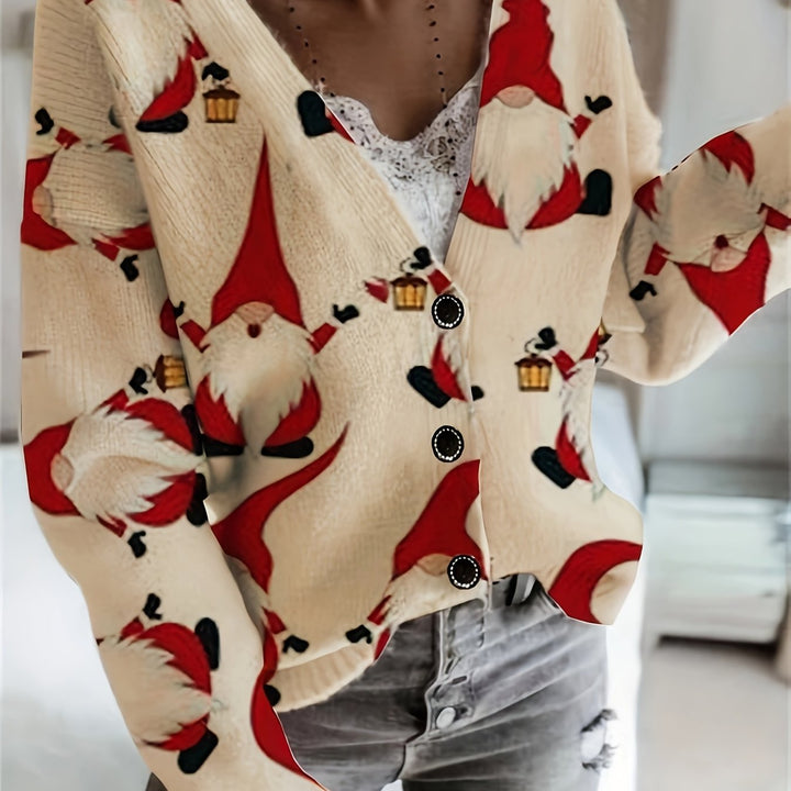Close up of a cream knit cardigan with a red gnome print and dark buttons