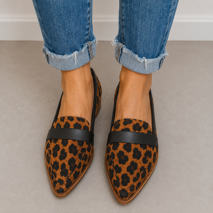 Leopard print pointed toe loafers with a dark vamp band