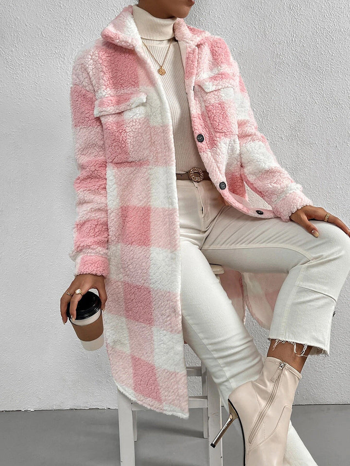 Pink and white teddy check coat falling to the knee, seated view
