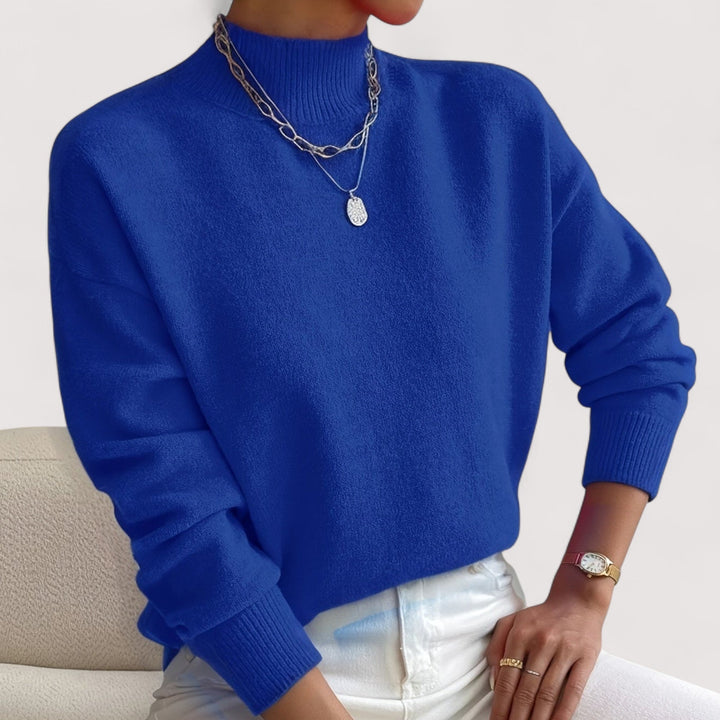 Cobalt blue mock neck knit sweater with long sleeves, front view