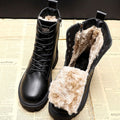 Black lace up winter ankle boots with thick fleece lining shown inside and out