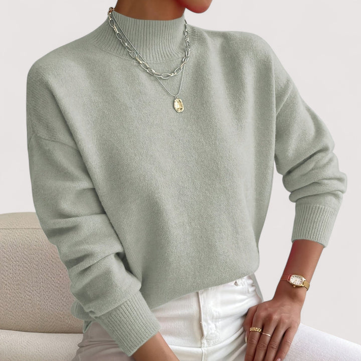 Sage green mock neck knit sweater with ribbed cuffs and hem