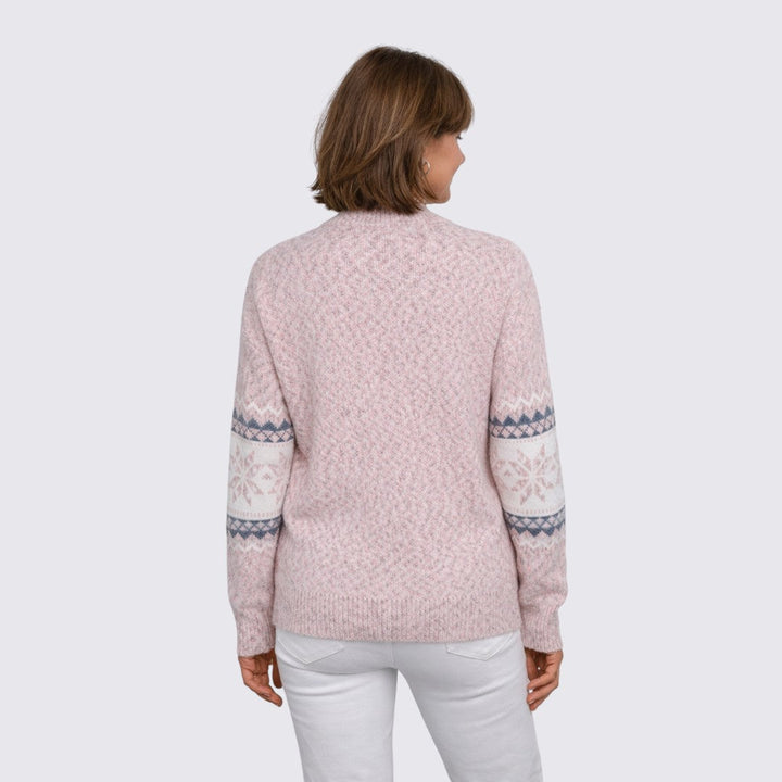 Back view of the pink knit sweater with snowflake pattern sleeve bands