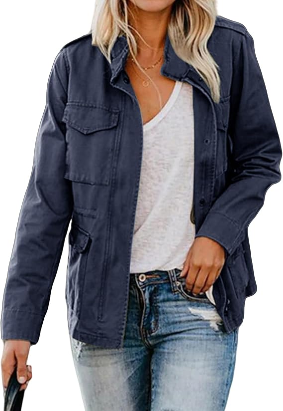 Navy zip front tailored jacket worn open over a white tee